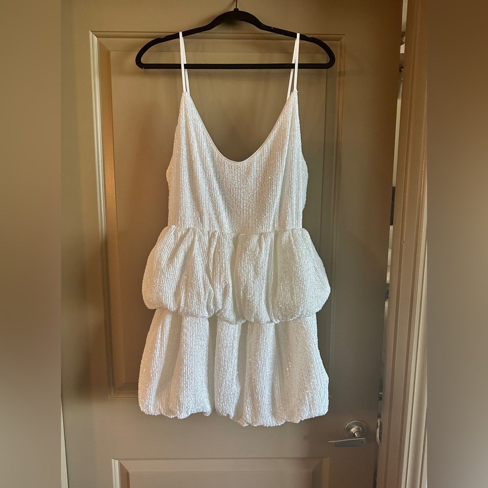 White NBD REVOLVE dress.